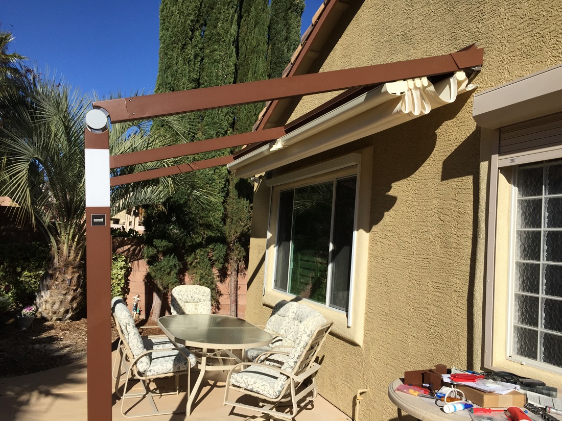 A retractable awning over a comfortable Nevada patio.