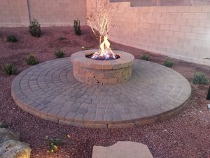 Picture of a fire pit in a backyard.
