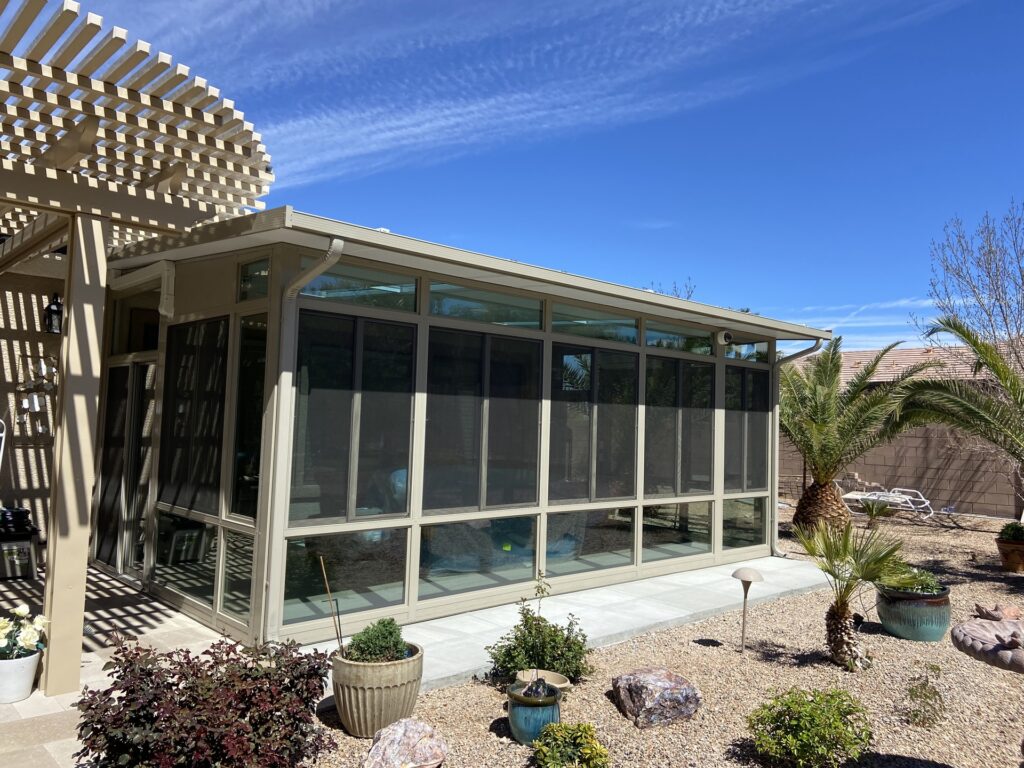 The exterior of a modern-style sunroom attached to a Las Vegas home.